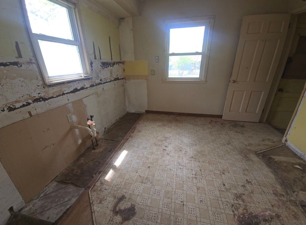 Empty room with peeling walls