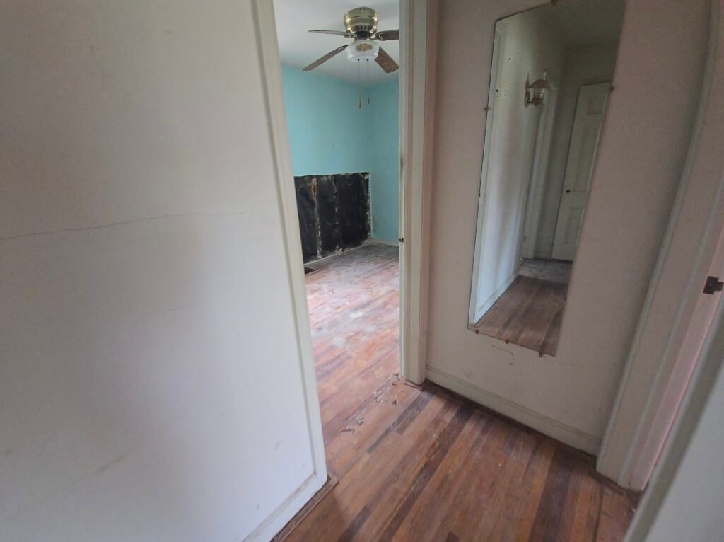 Empty room with wooden floor